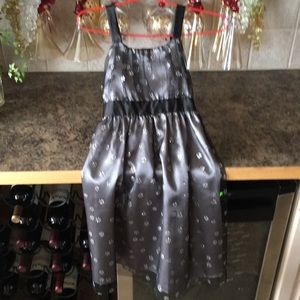 Girls glittery silver and black dress size 12